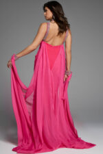 Back view of a pink gown with shimmering accents and open-back design.