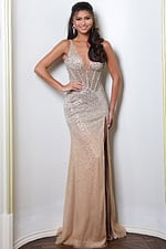 nude deep v neck beaded evening gown with fitted silhouette - front full body, hand on hip smiling drop earrings