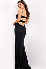 Black beaded gown with strappy cutout bodice and thigh slit