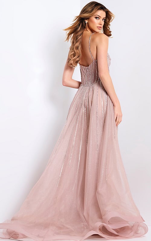 Blush pink prom gown with corset top and shimmering beaded design