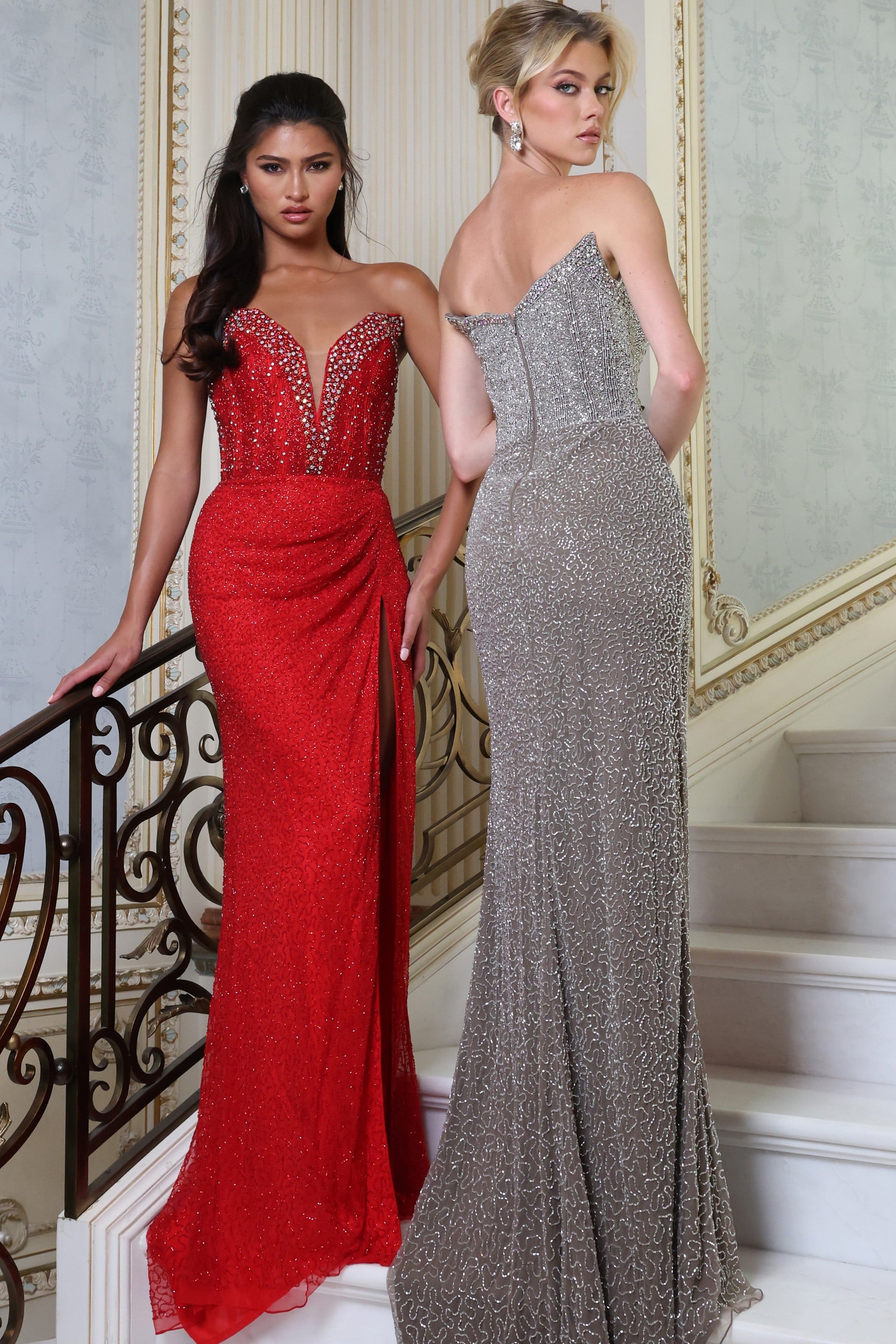 elegant sparkling dress with deep v neckline - two girls front, red/silver gowns, updo, slit