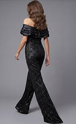 Back view of beaded wide leg jumpsuit with off shoulder draped neckline, fitted waist, and flowing pants