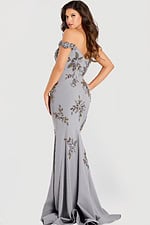 back of silver off the shoudler embellished dress