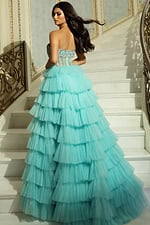 Back view of layered tulle evening gown with sheer corset bodice