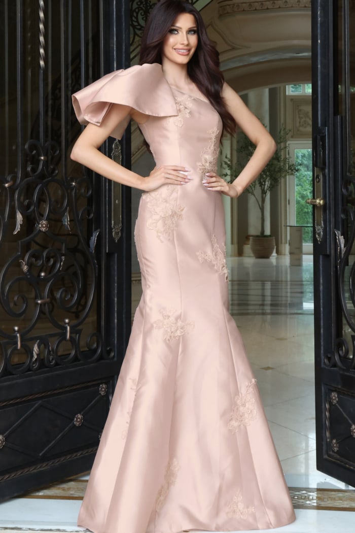 Blush pink one-shoulder mermaid gown with ruffle sleeve and floral lace appliqué