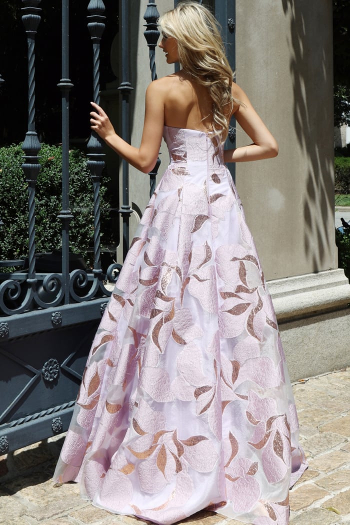 Floor-length lilac floral gown with a full A-line skirt.