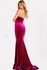 Elegant velvet strapless gown with structured bodice and flowing skirt
