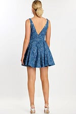 Back view of sleeveless mini dress with low V-cut and floral embellishments