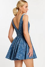 Side-back angle highlighting the flare and structure of the embroidered skirt