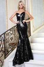 black strapless sequin mermaid prom dress - front full body, hands on hips grand staircase