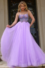Model wearing Jovani 44511 lilac gown with embellished bodice.
