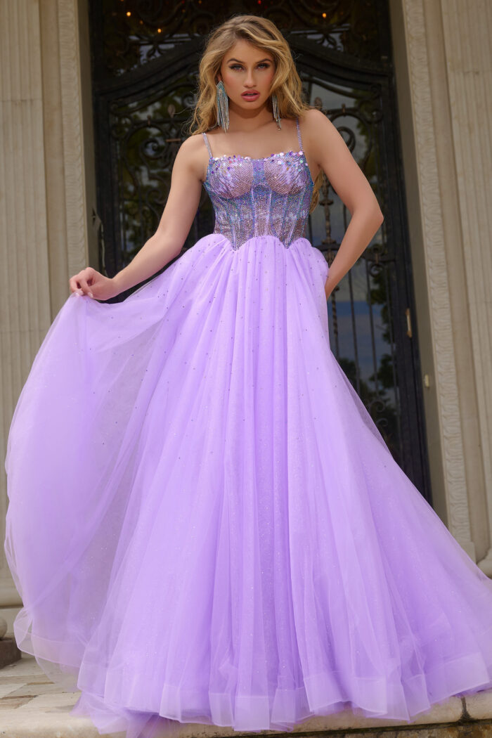 Model wearing Jovani 44511 lilac gown with embellished bodice.