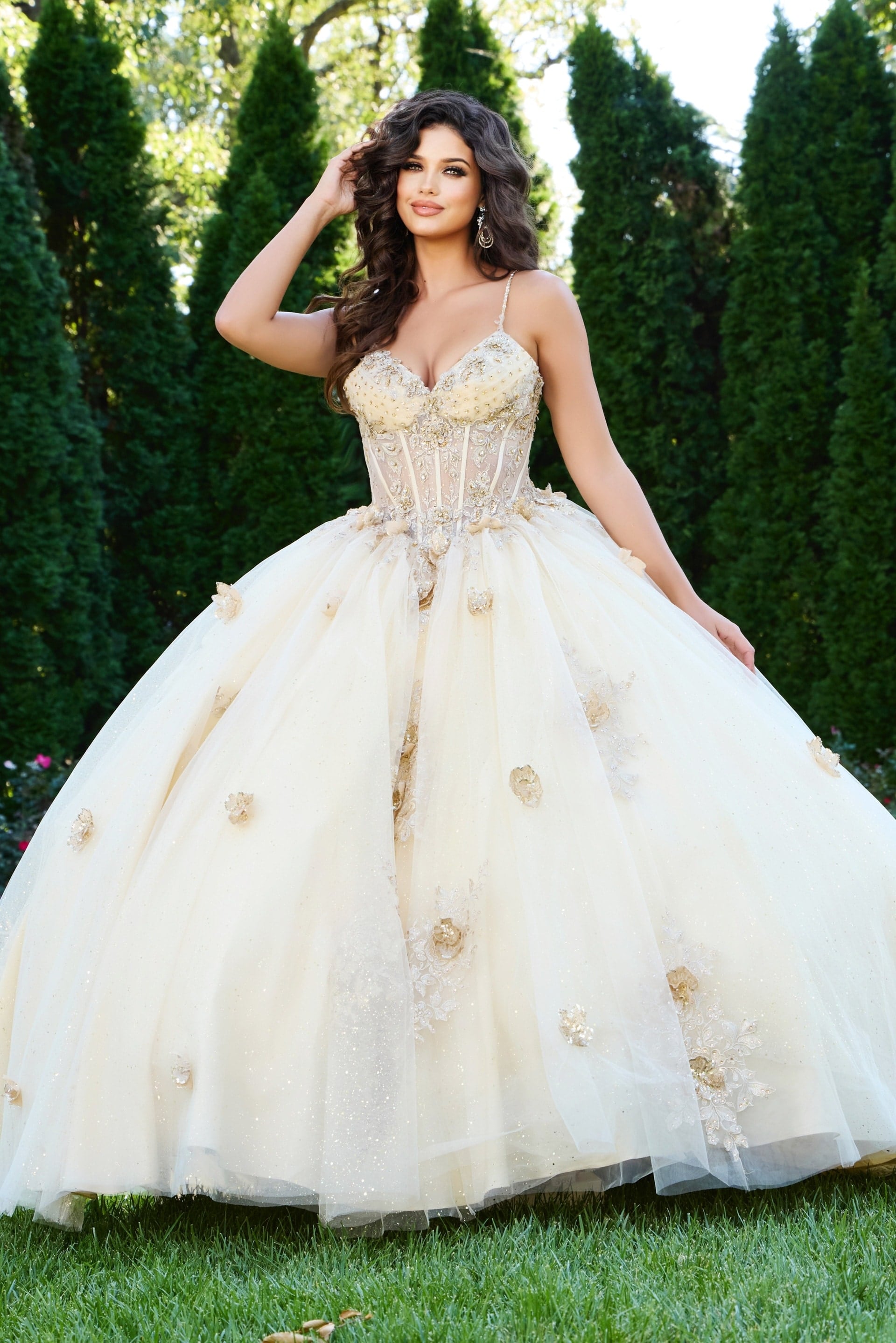 44559-1 Model wearing Jovani 44559 ball gown with sweetheart neckline and floral details.