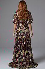 Floral V neck gown with puff sleeves and flowing silhouette