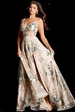Elegant sleeveless dress featuring sheer bodice and soft floral applique details