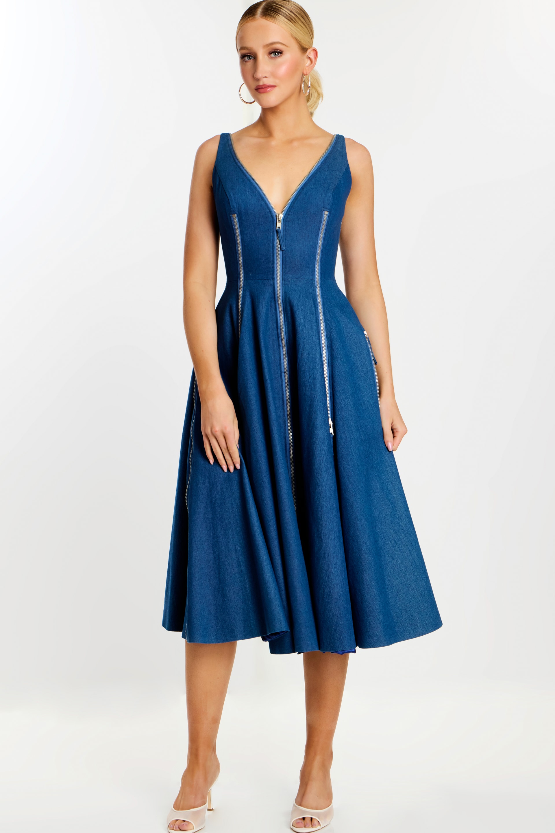 44680_DENIM_1 Front view of sleeveless denim midi dress with plunging neckline and zipper accents