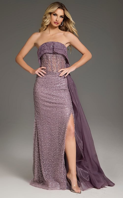 Model wearing Jovani 44842 purple gown with high slit and embellishments.