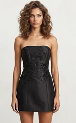 Front view of strapless fitted mini dress with floral beading and clean structured silhouette