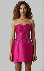 Front view of strapless fitted dress with floral beading and clean structured skirt