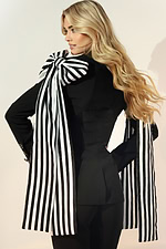 Stylish black suit with bold striped bow and crystal button details