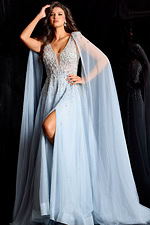 Glamorous beaded evening gown with illusion bodice and long draped cape