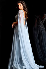 Light blue beaded gown with flowing sheer cape and deep V neckline