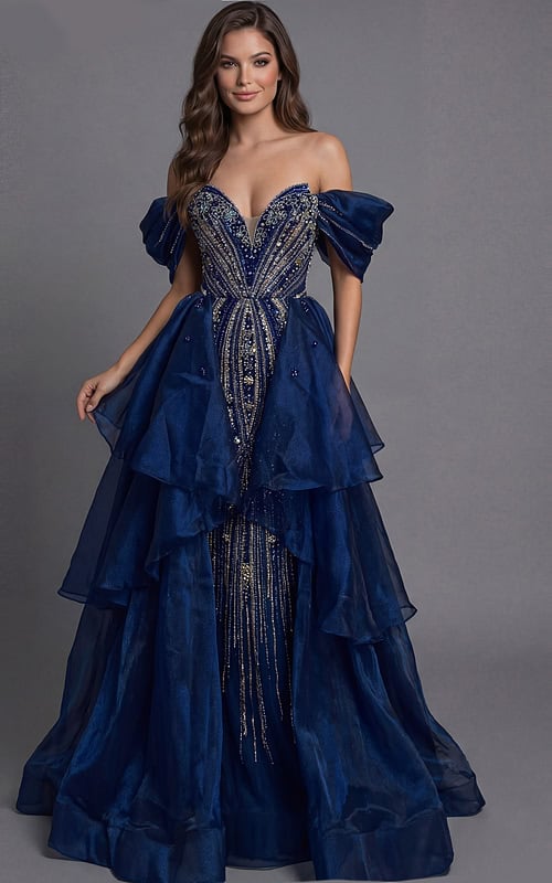 Jovani 45076 navy blue off-the-shoulder ball gown with crystal and silver beaded bodice, puff sleeves, deep sweetheart neckline, and tiered layered organza skirt with beaded center panel.