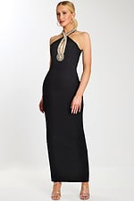 Model wearing a fitted black halter gown with crystal-embellished keyhole neckline 45106