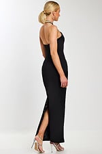 Angled back view of the black formal dress with slit and curve-hugging design