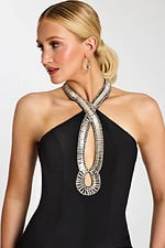 Close-up of crystal beaded halter neckline with double teardrop cutout on black gown
