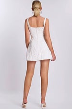 Back view of short floral lace dress with thick straps and square back neckline