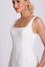 Side bust view of floral lace dress with square neckline and detailed beadwork