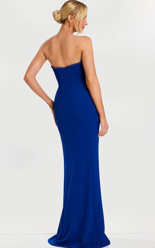 Back view of strapless fitted dress in royal with crystal trim