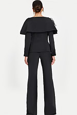 Elegant Black Power Suit Featuring 3D Floral Accent and Flared Pants