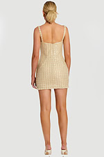 littering Champagne Tweed Ensemble with Decorative Buttons