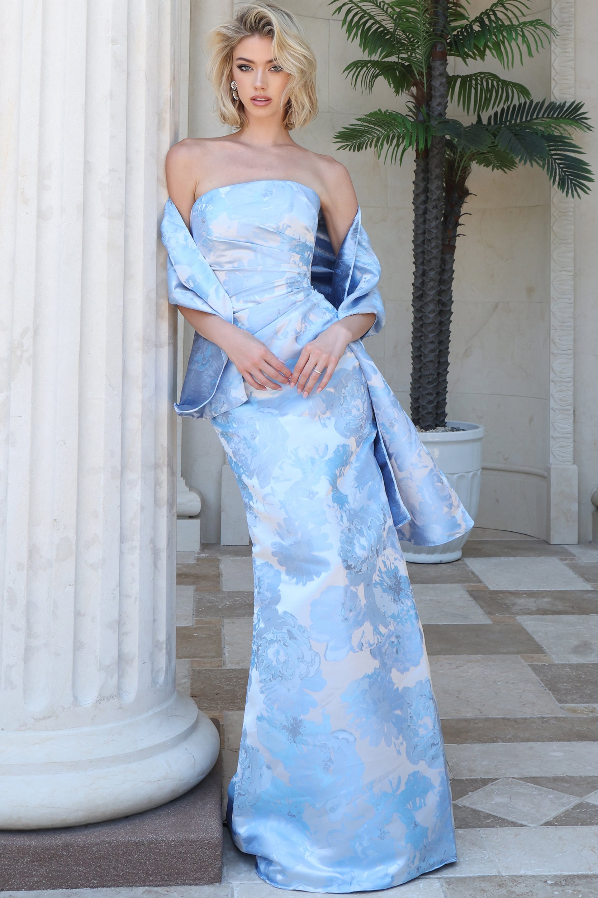 Light blue strapless floral jacquard gown with matching wrap.