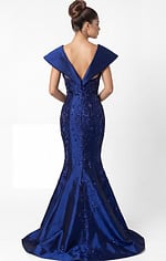 beaded mermaid gown with open V back and flowing train