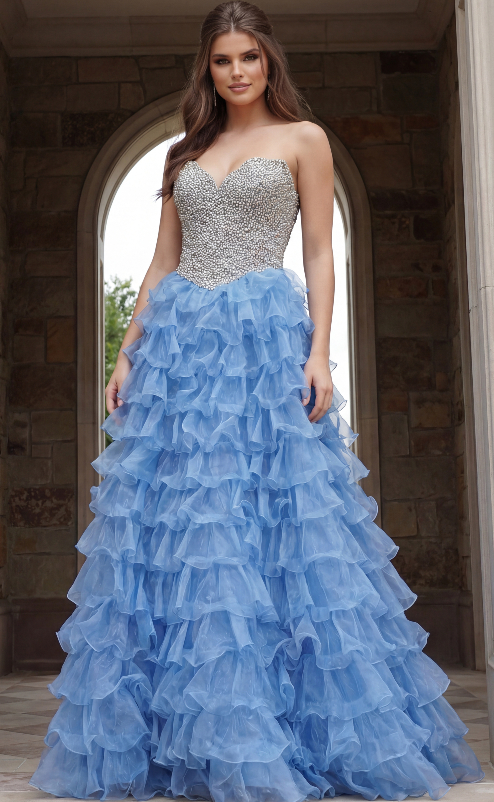 Strapless gown with fully beaded sweetheart bodice and voluminous tiered ruffle skirt in sheer layered fabric