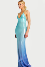 Side view of open-back halter ombre evening gown
