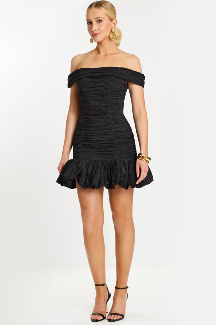 Back view of off-the-shoulder black mini dress with ruched texture