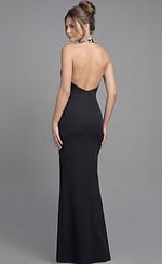 Back view of a fitted halter gown with open back and smooth floor length silhouette