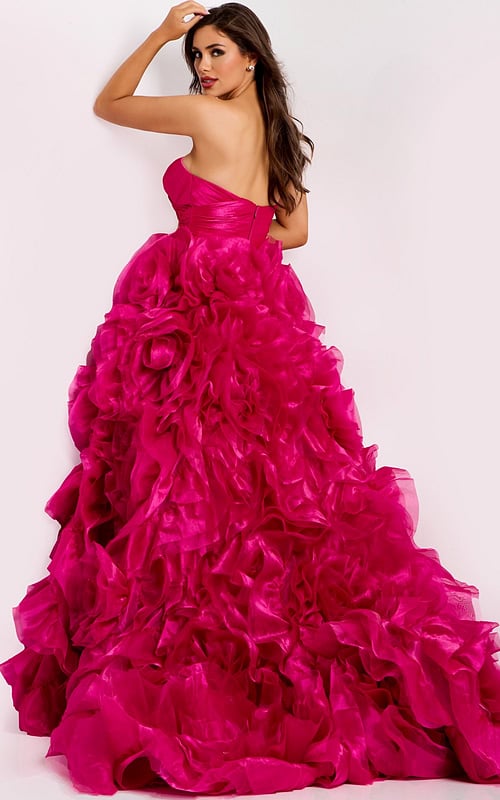 Glamorous strapless prom dress featuring dramatic layered flowers