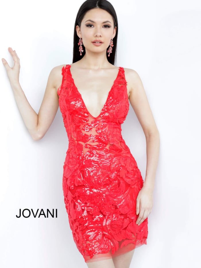 Model wearing Jovani 4552 red dress with floral sequins, front pose