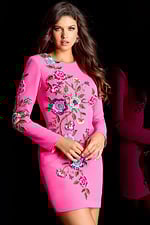Bright pink embellished dress with intricate beaded flower patterns