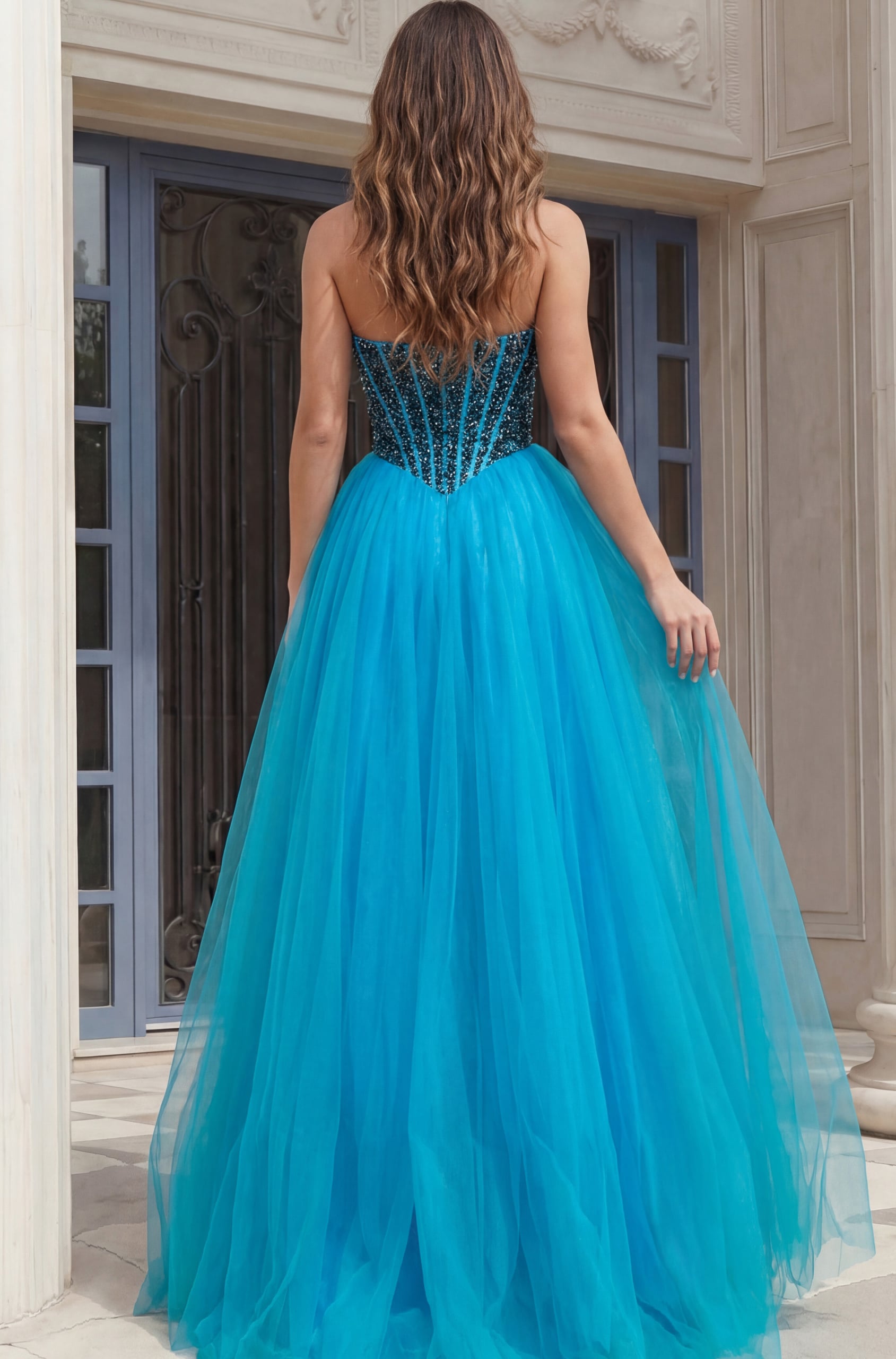 back of blue embellished prom dress 45539