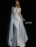 Model wearing Jovani 45566 ivory gown with sweetheart neckline and cape