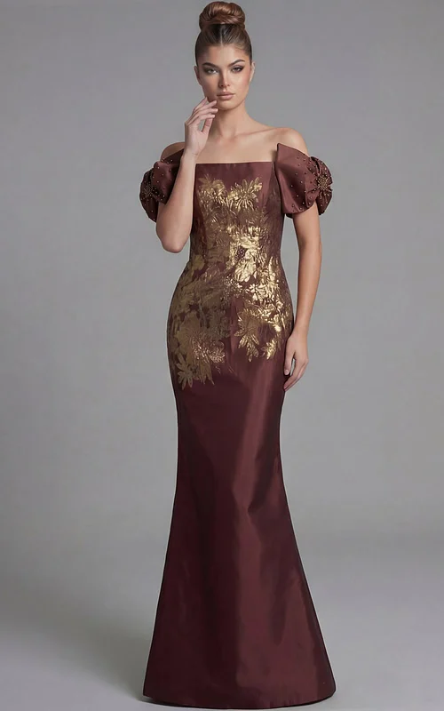 Front view of off shoulder column gown with square neckline and gold floral brocade detailing