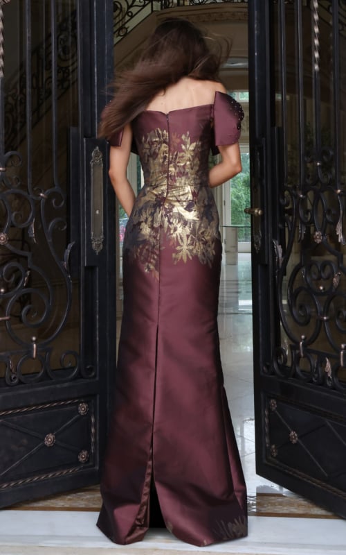 Burgundy off-the-shoulder gown with metallic gold floral print, back view