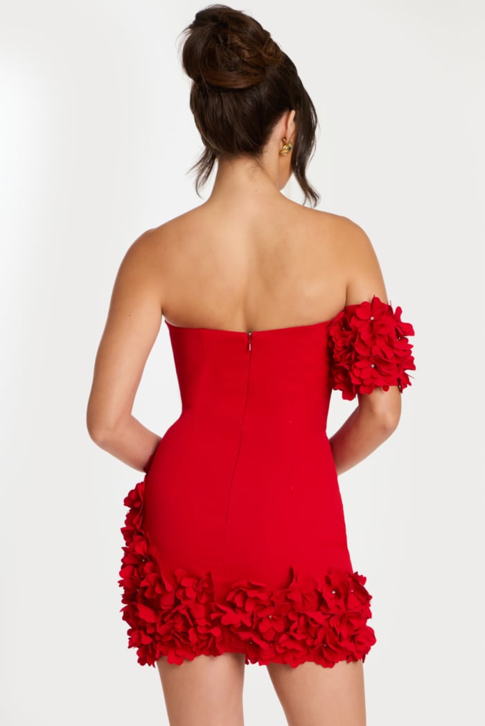 Back view of strapless red mini dress with floral hem