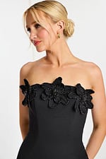 Close-up of beaded flower embellishments on strapless neckline